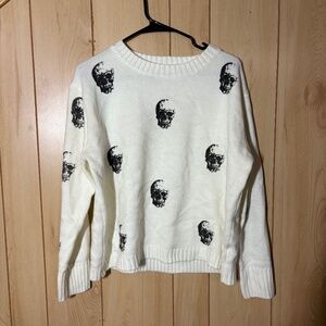 Panache Apparel - white sweater with black skulls